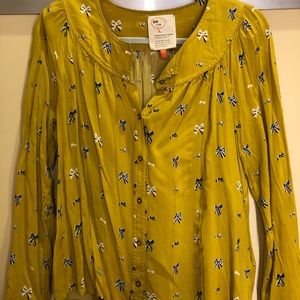 Anthro bow print blouse.